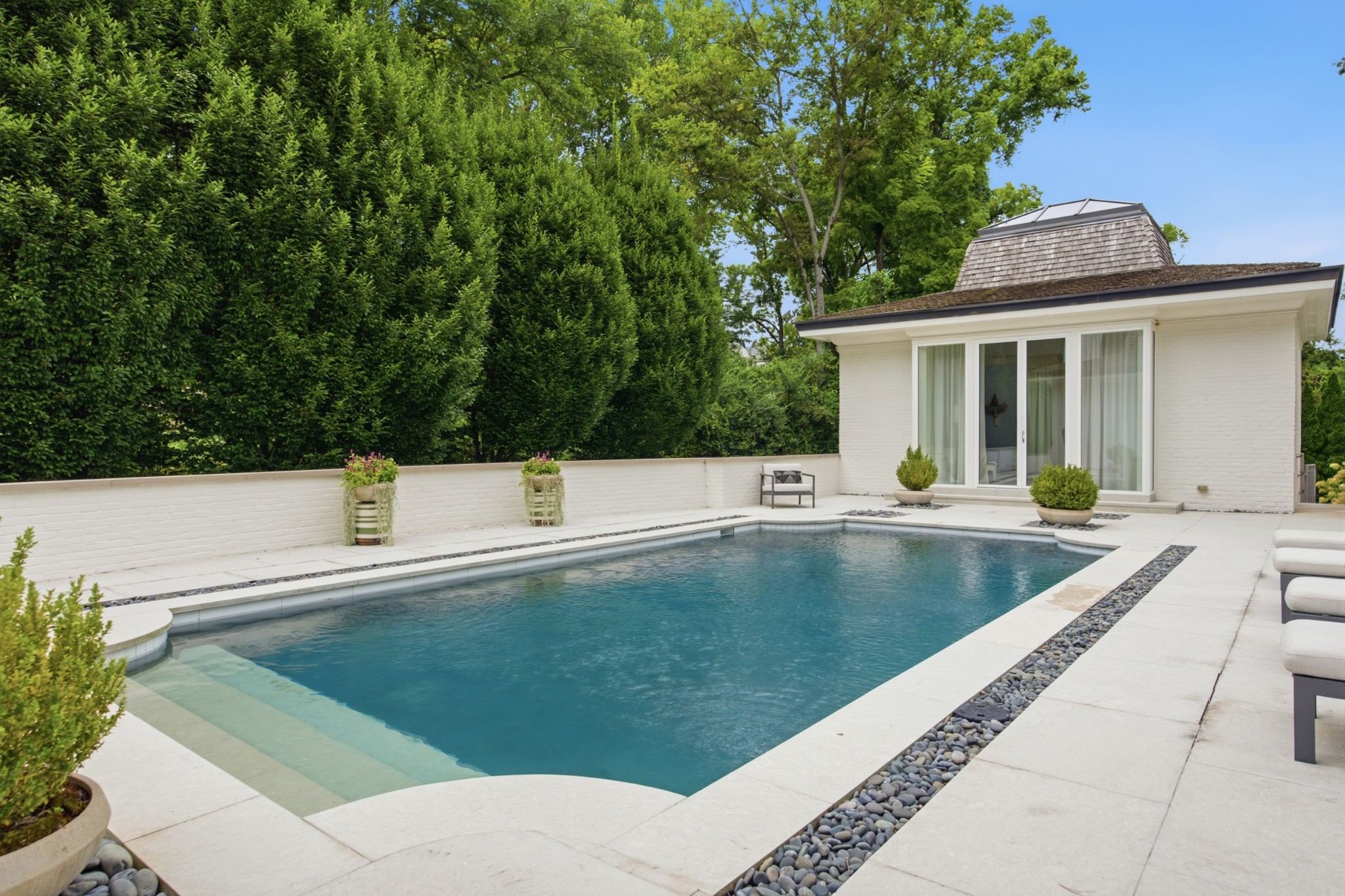 Pool and detached pool house behind 109 Westhampton Place in Belle Meade Nashville
