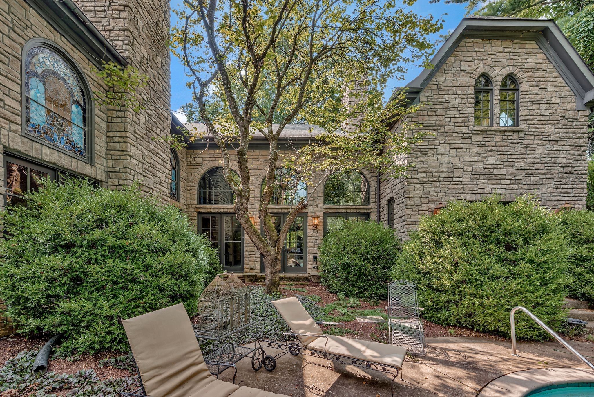 Stone exterior wall with landscaping at 1108 Belle Meade Boulevard in Belle Meade Nashville